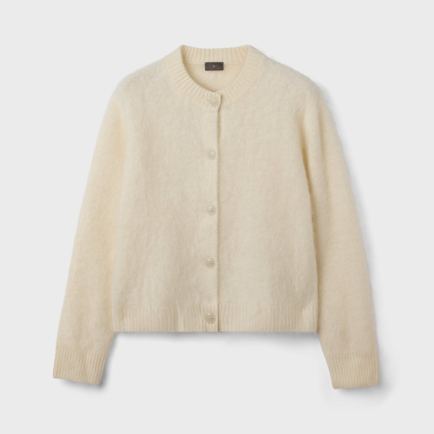 Beige cardigan on a light gray background